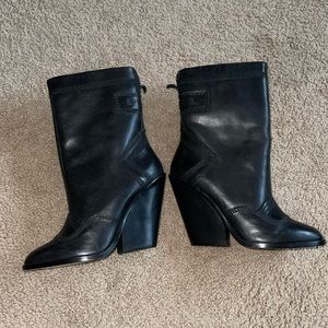 Black diesel boots with angled heel